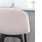 Upholstered Solid Wood Counter Stool With Footrest by East at Main